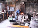 Art Shaw demonstrates his blacksmithing skills.