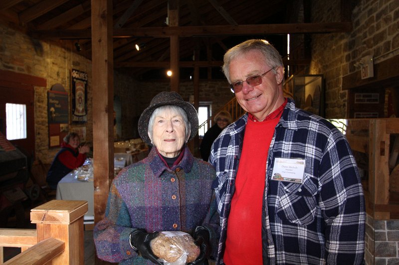 Beth Robinson, one of the original four trustees that took over the Old Stone Mill from owner Hastings Steele in 1963 and set it on its course to what it has become today with The Delta Mill Society President Dann Michols.  Delta Harvest Festival 2015