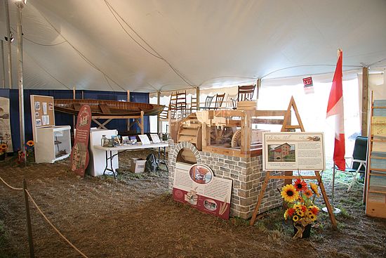 The Delta Mill Society's display at the IPM.  In addition to the working waterwheel, we had signboards, antique chairs (and the tools that made them), antique skiffs (and the tools that made those) plus a selection of our books on display.  Our volunteers handed out hundreds of our brochures and many people visited the Mill during the IPM as a result.