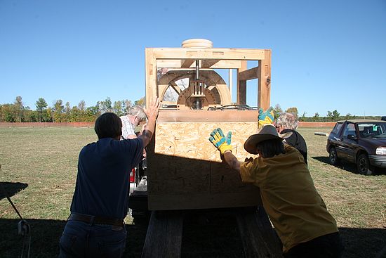 Many hands made loading the 400+ lb waterwheel model into the back of a pickup truck a relatively easy job