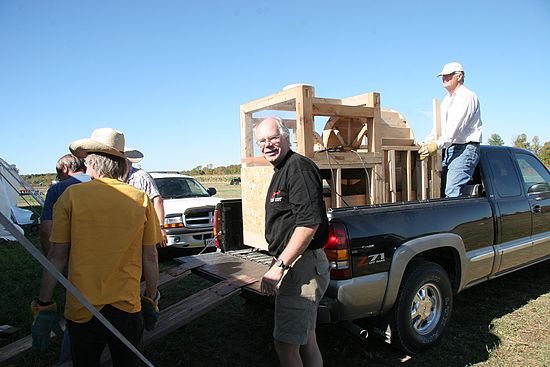 The crew gets ready to secure the waterwheel model in the back of the truck.  The model travelled unscathed to and from the IPM.  Rumour has it that this cannot be said for a couple of other display racks that suffered minor mishaps on County Road 42 (who would have guessed that 2 by 6s have aerodynamic qualities?).