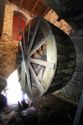 It is believed that the original waterwheel, just slightly larger than this one, may be been in a "waterhouse"  a separately enclosed structure within the mill.  The door above the wheel speaks to this - it matched an Oliver Evan's design for a waterhouse.  One advantage of a waterhouse is the ability to heat the enclosed area to prevent the freezing of the wheel.